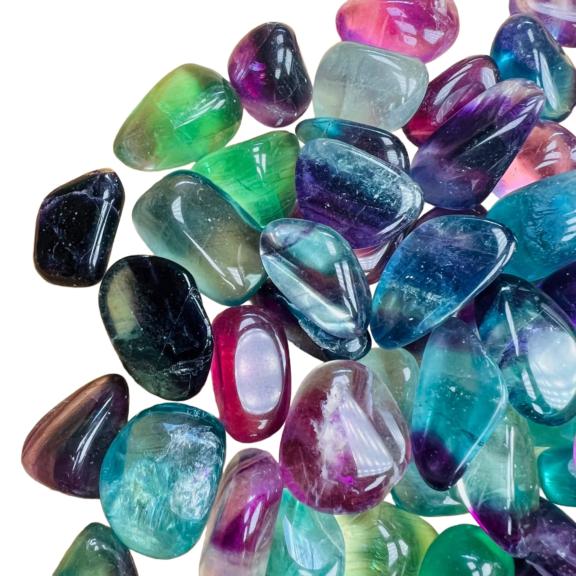 Edge view of Fluorite tumbled stone, worked with for Focus and Meditation.
