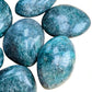Tight crop of Grade AA Fuchsite palm stone, showing color depth.