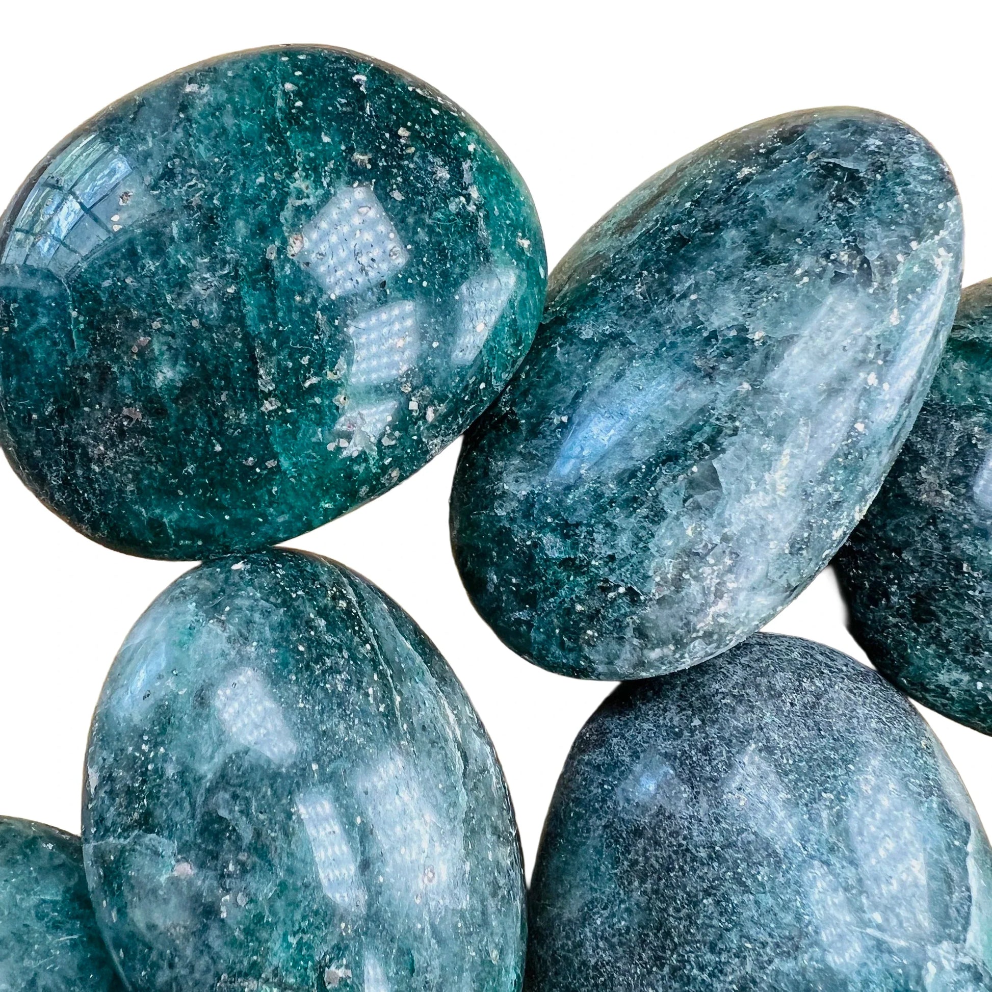 Rear view of green Fuchsite palm stone, showing characteristic finish.