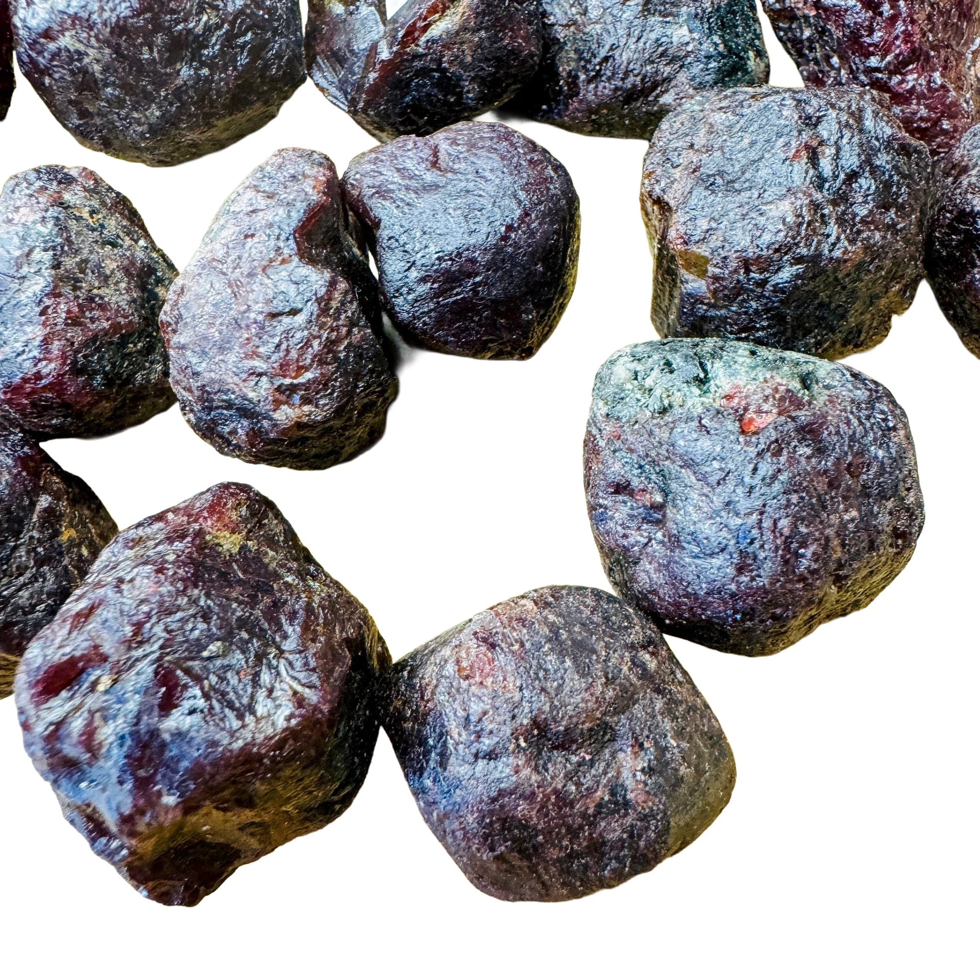 Side profile of Garnet raw stone, often paired with practices around Energy, hand-selected from Paraíba, Brazil.
