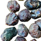 Top-side view of Grade A Garnet raw stone, showing characteristic color, sourced from Brazil.