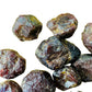 Back view of Garnet raw stone, often kept for Energy.