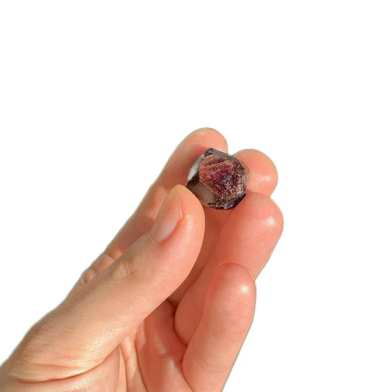 Back view of Grade AA Garnet raw showing natural surface