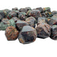 Near view of Fuchsite raw stone, showing earthy tone.