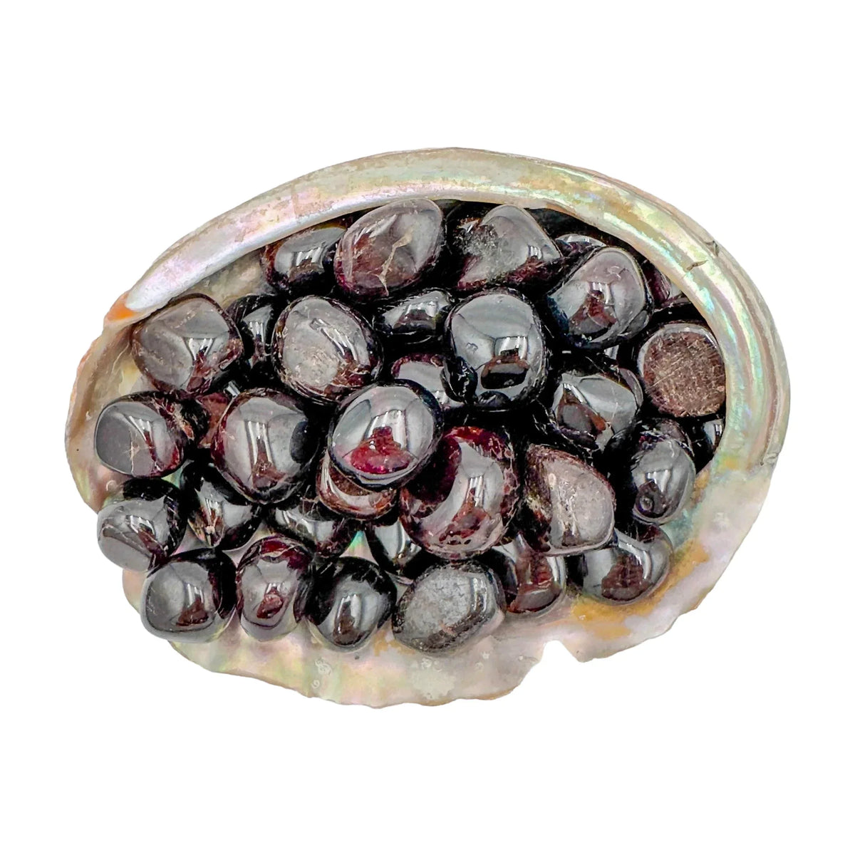 Up-close view of Garnet tumbled stone, showing natural inclusions.