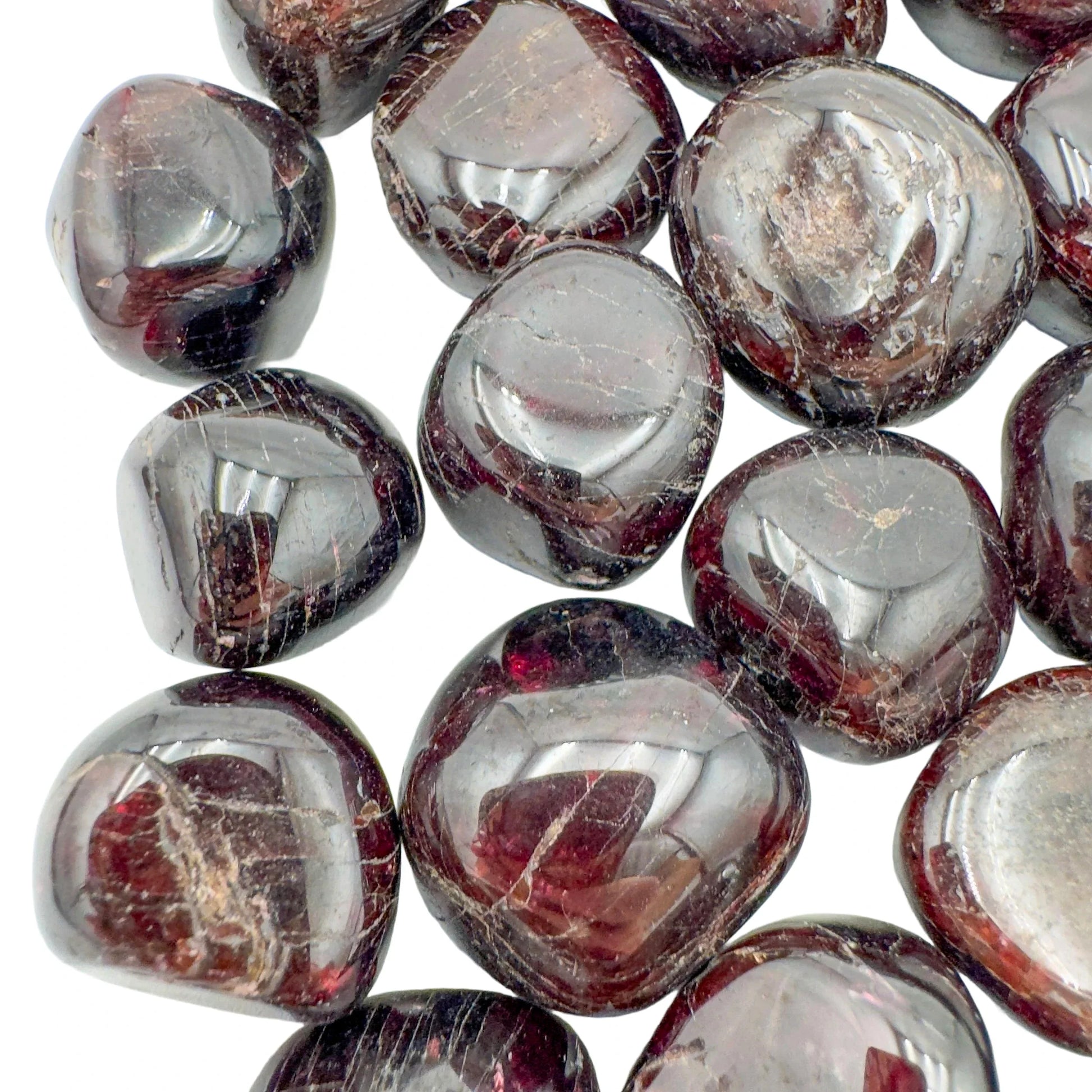Underside view of Garnet tumbled stone, sourced from Malawi, to support Energy and Confidence.