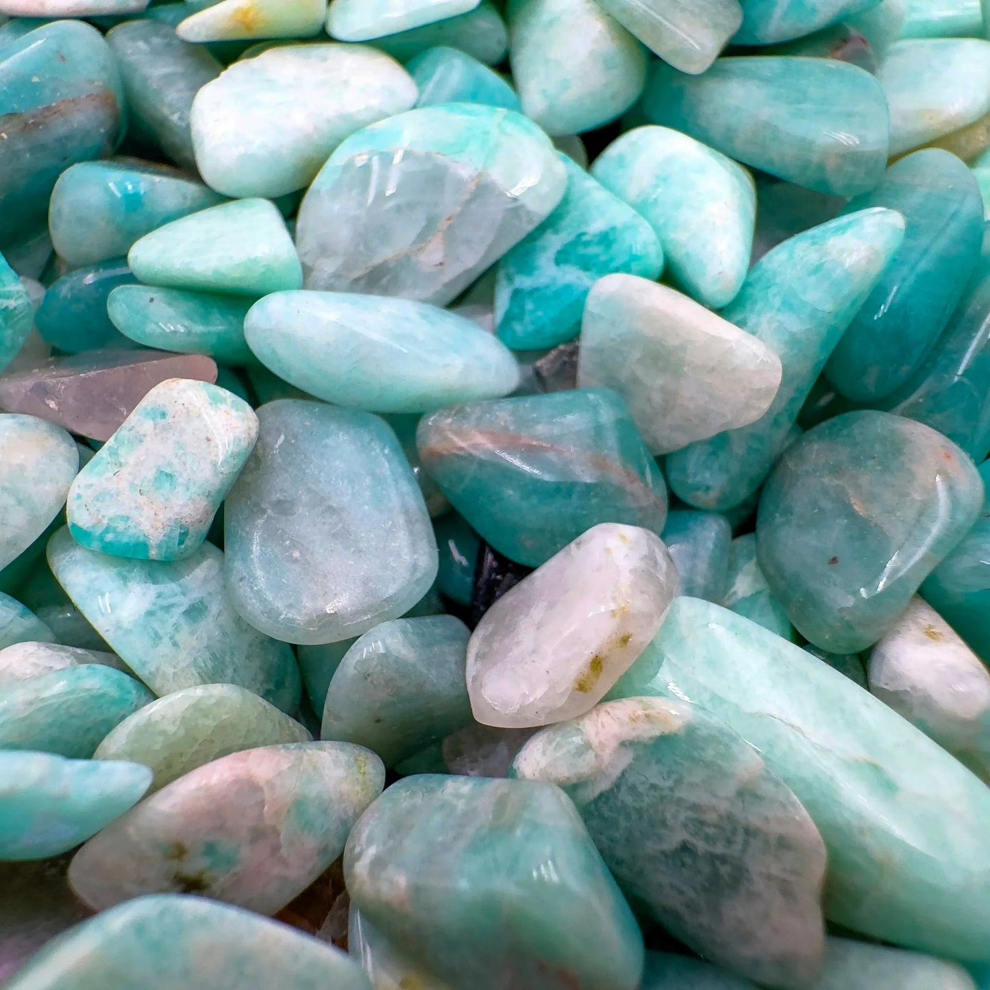 Detail capture of Grade A Amazonite polished chip, showing subtle veining.