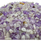Amethyst chips scattered on surface, ethically sourced Madagascar quartz chips