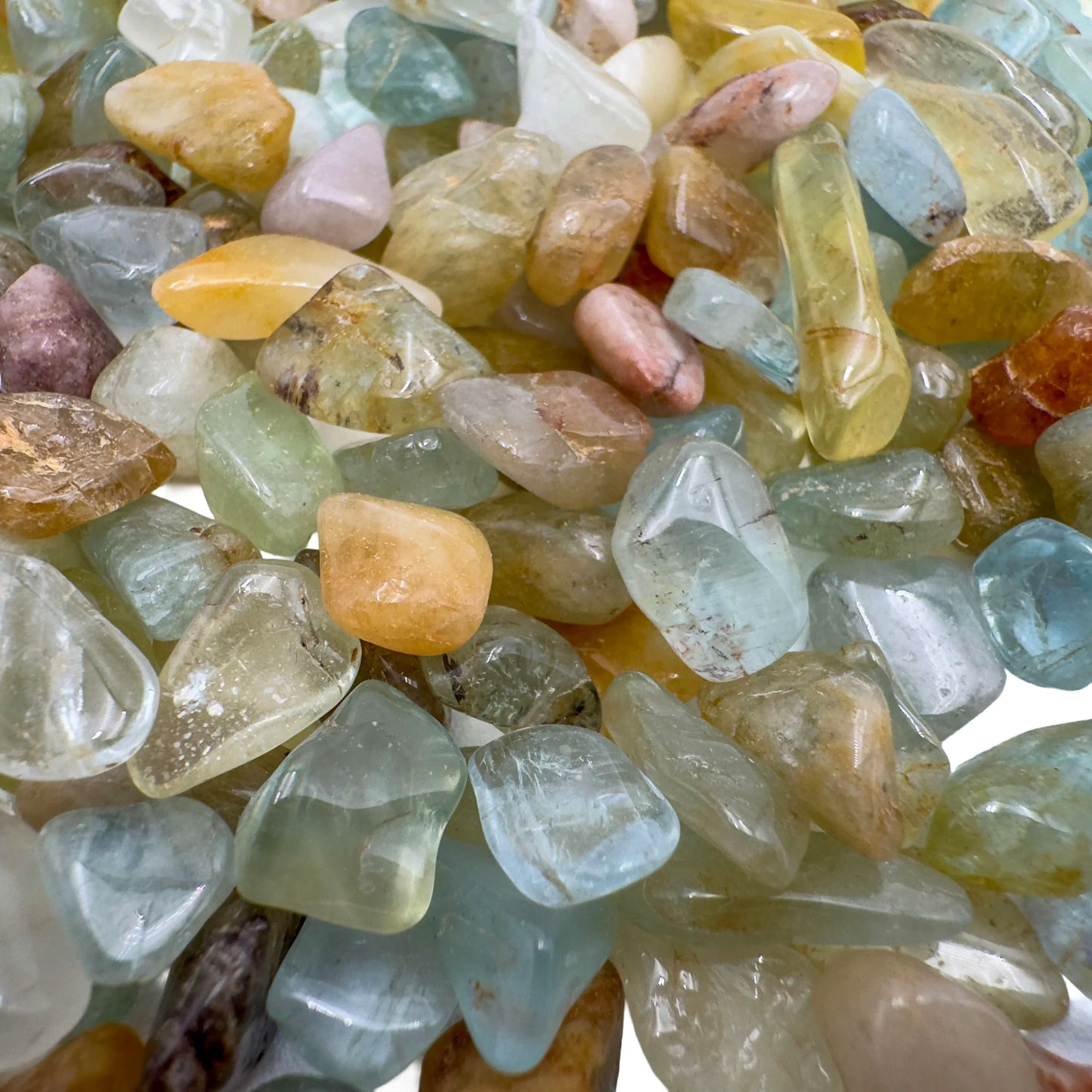 Underside view of blue Aquamarine polished chip, hand-selected from Huila, Angola.