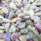 Magnified detail of purple Lepidolite polished chip, sourced from Namibia, worked with for Stress Relief.