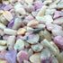 Magnified detail of purple Lepidolite polished chip, sourced from Namibia, worked with for Stress Relief.