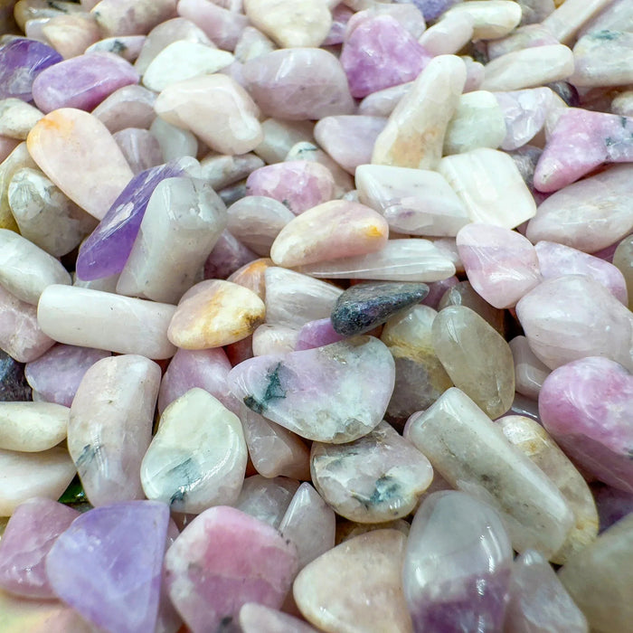 Magnified detail of purple Lepidolite polished chip, sourced from Namibia, worked with for Stress Relief.