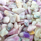 Overhead angle of Lepidolite polished chip, carried for Stress Relief and Emotional Healing, showing natural texture.