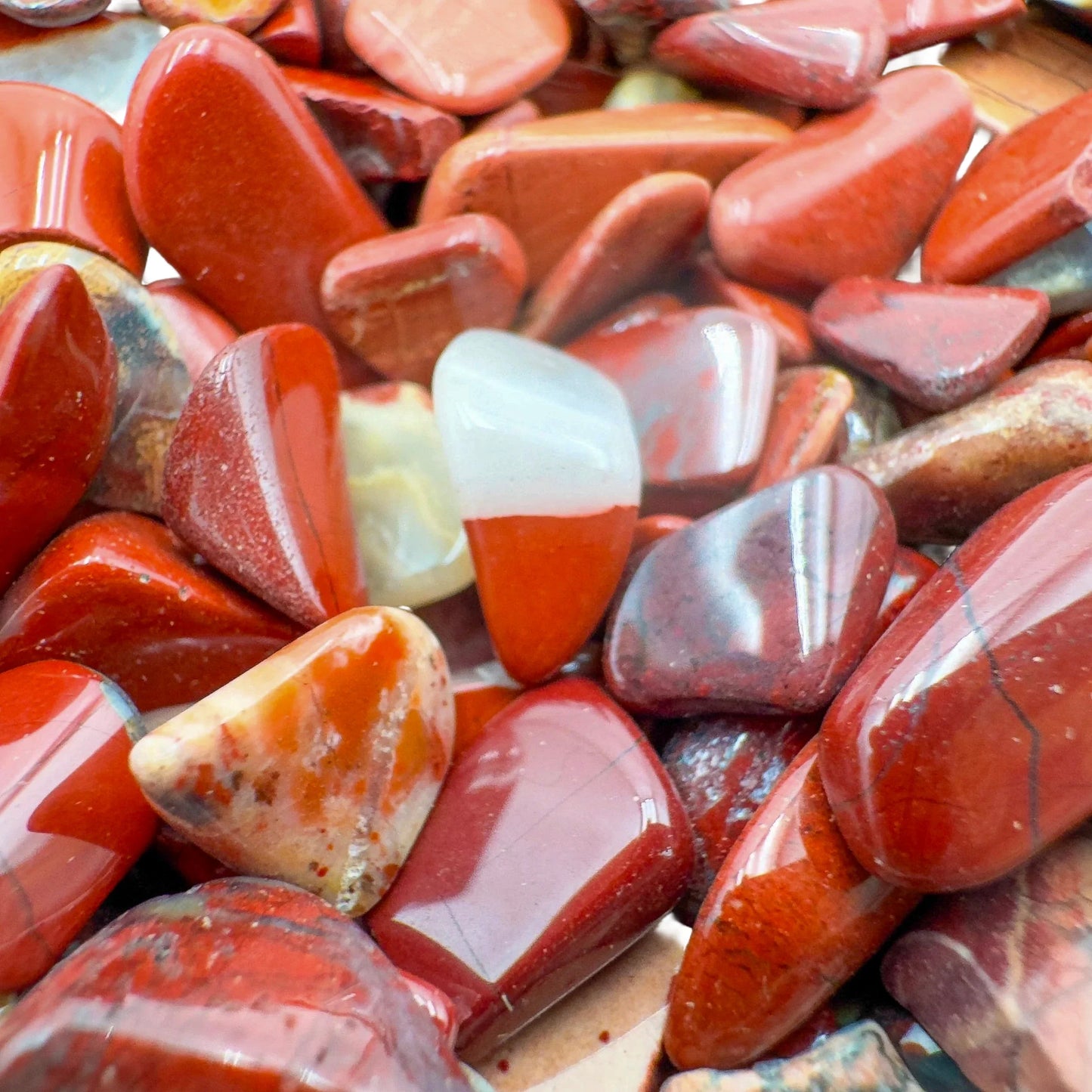 Side angle of Red Jasper polished chip, drawn on for Grounding and Energy.