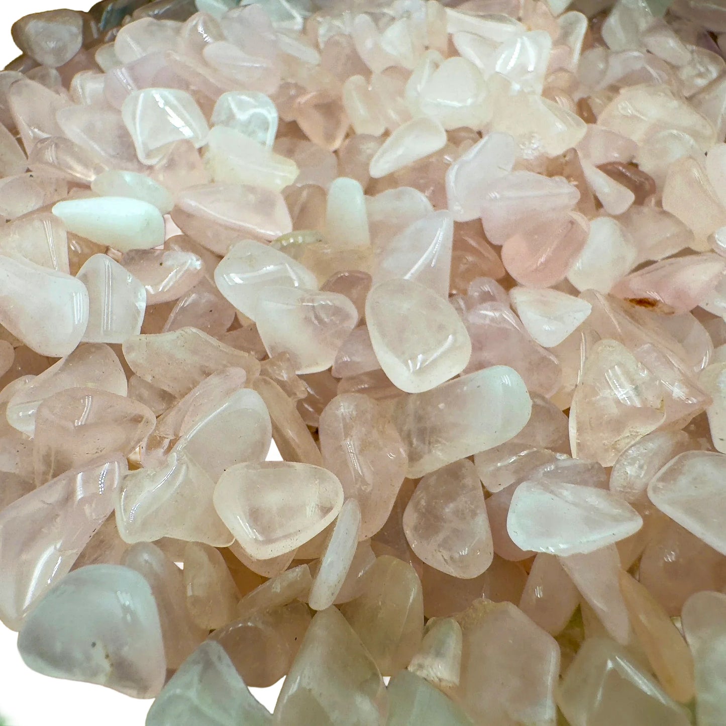 Detail of Rose Quartz polished chip, showing translucent edges.