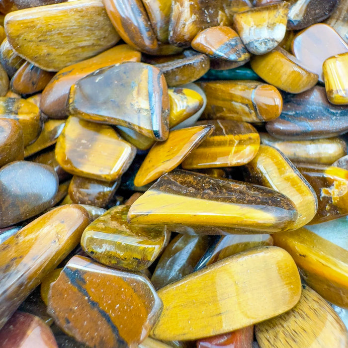 Lateral view of brown Tiger Eye polished chip, sourced from Northern Cape, South Africa.