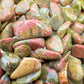 Side angle of Unakite polished chip, carried for Emotional Healing, showing natural inclusions.
