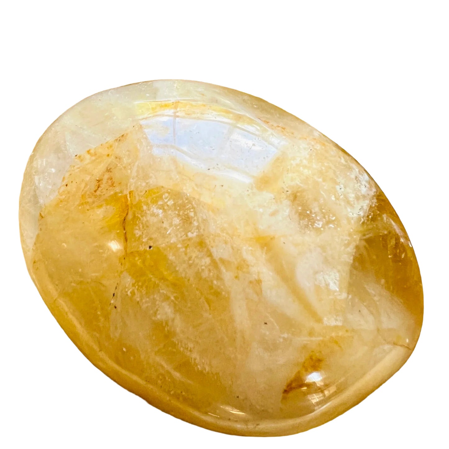Side perspective of Golden Healer palm stone, showing natural sheen, kept close for Healing and Meditation.