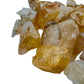 Edge-on view of Golden Healer raw stone, linked to Confidence and Energy, showing characteristic patterning.