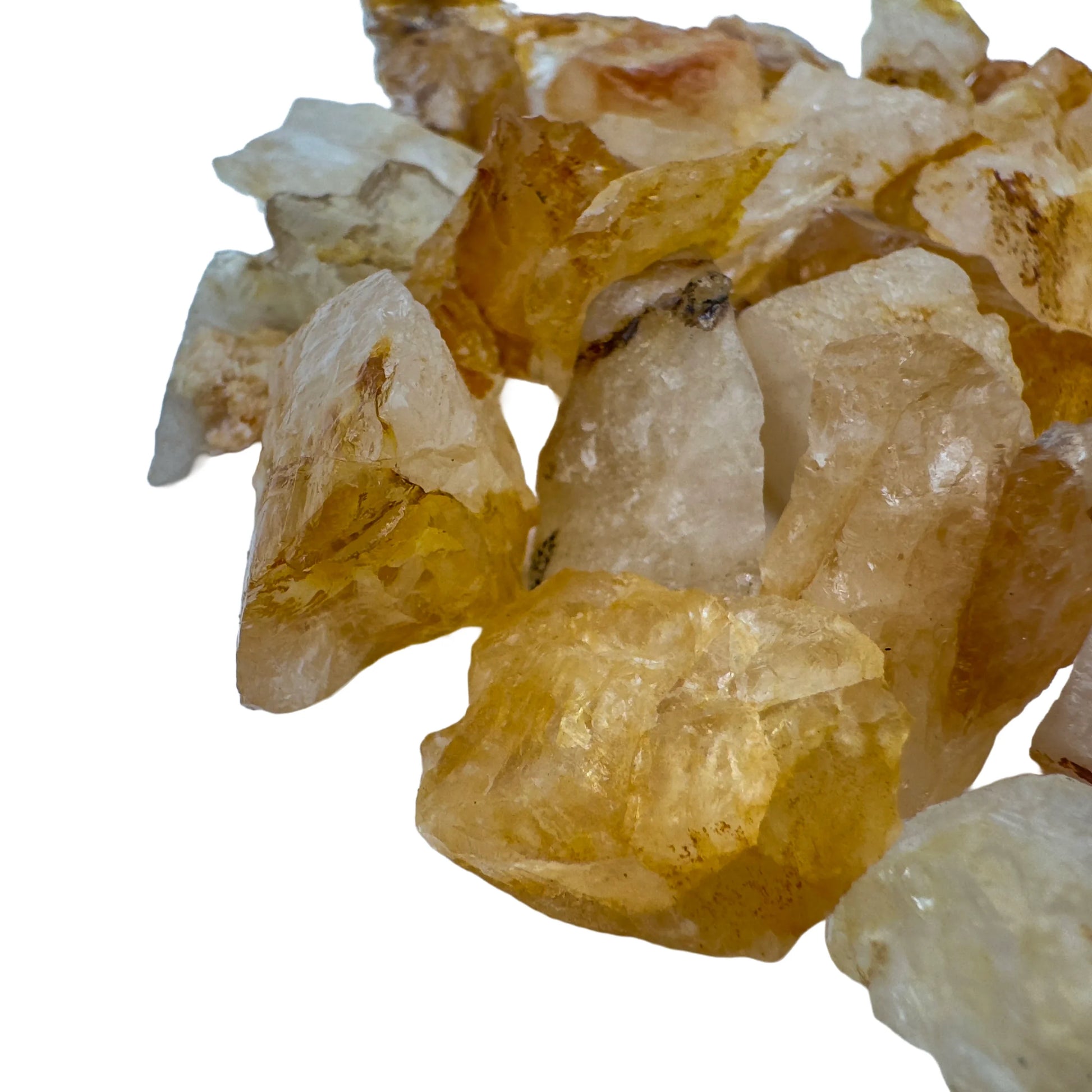 Edge-on view of Golden Healer raw stone, linked to Confidence and Energy, showing characteristic patterning.
