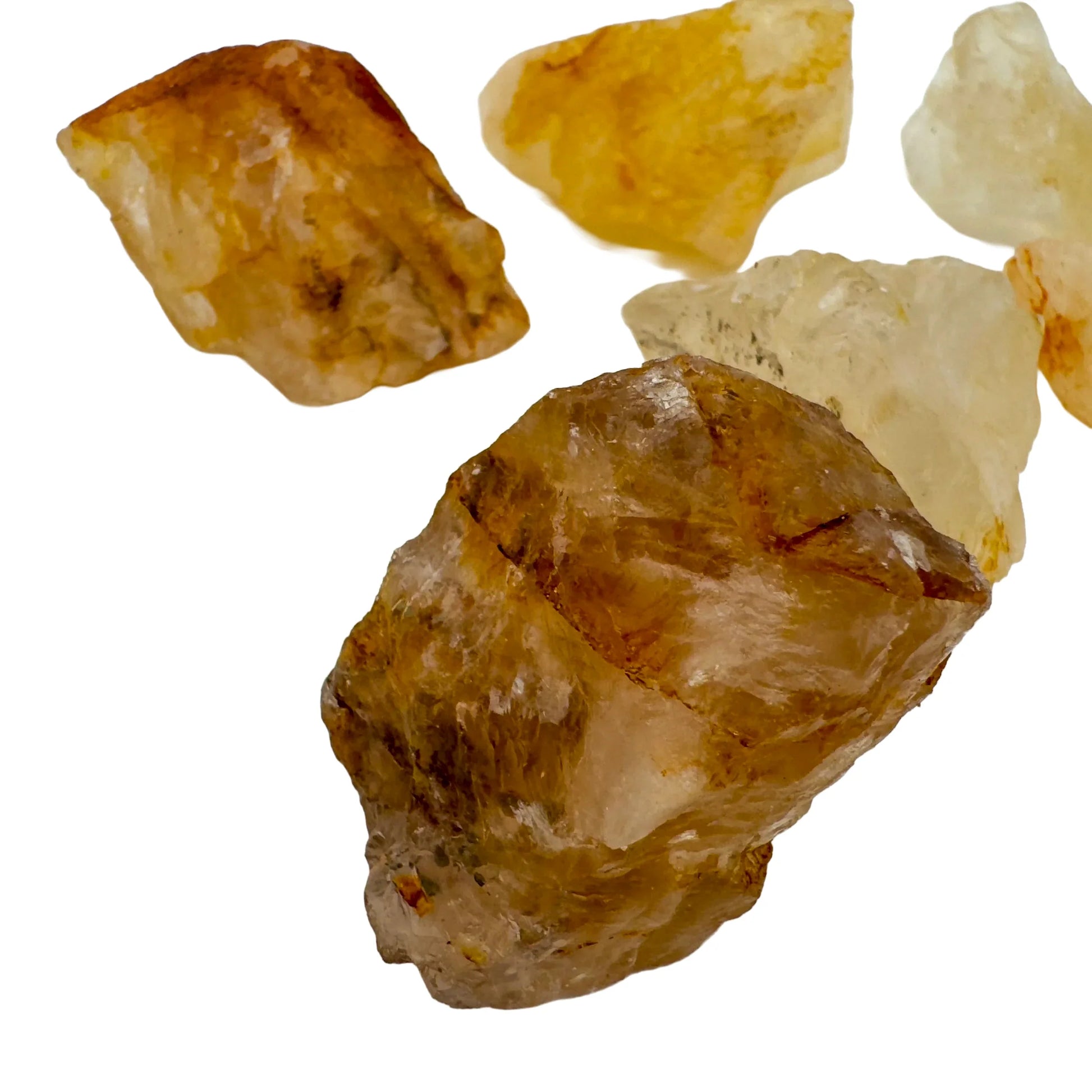 Top-down shot of Grade AA Golden Healer raw stone, Brazil-sourced, showing characteristic finish.