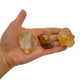 Whole-piece view of Golden Healer raw crystal, from Minas Gerais, Brazil, in the warmth of daylight.