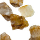 Profile shot of yellow Golden Healer raw stone, often paired with practices around Healing and Meditation, from Madagascar.