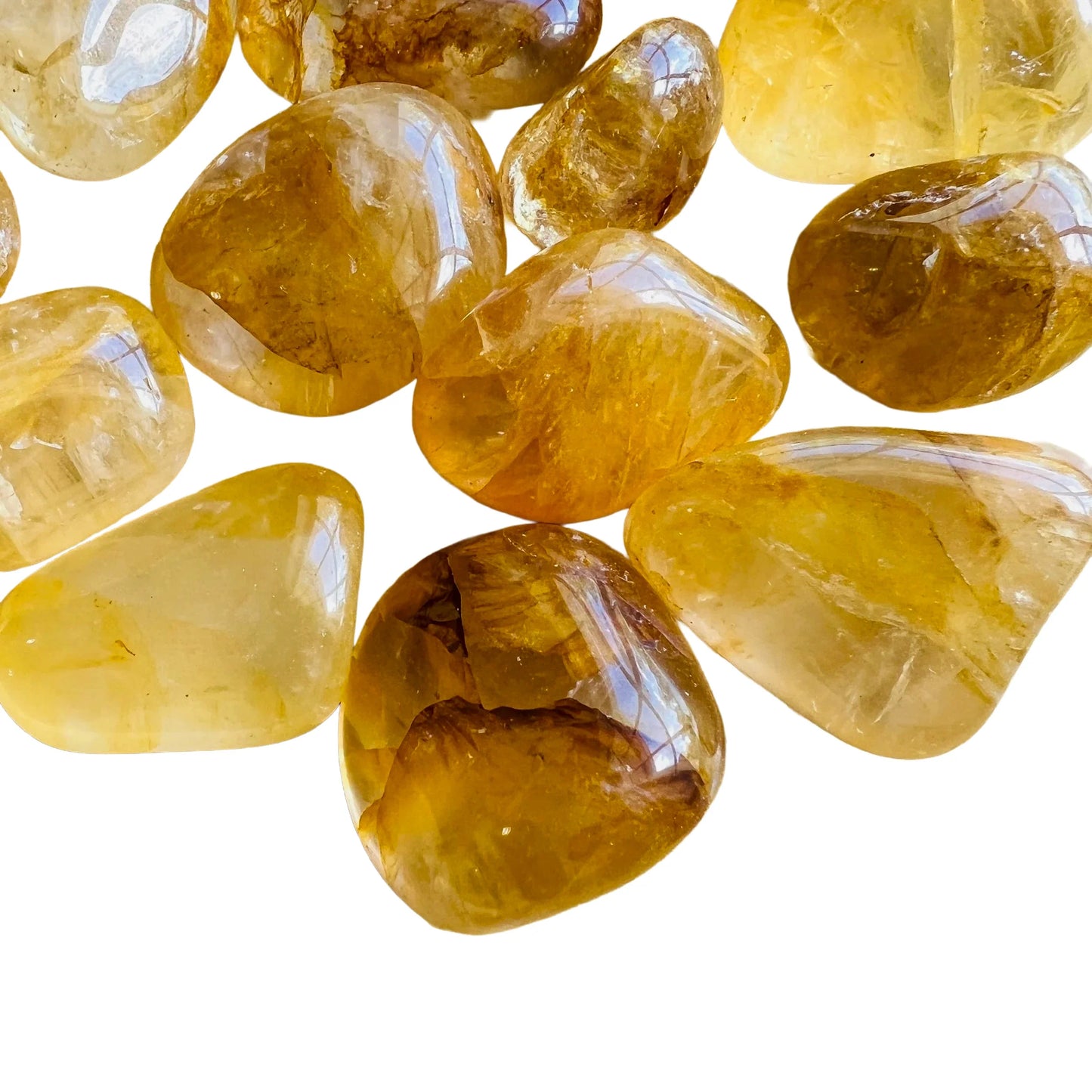 Natural surface of Grade AAA yellow Golden Healer tumbled stone, linked to Healing and Meditation, sourced from Brazil.