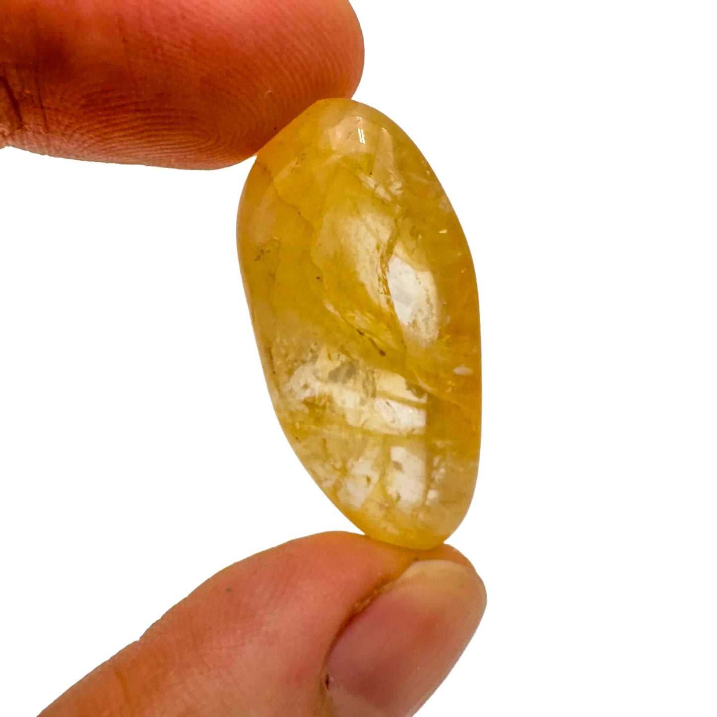 Back view of Grade AAA Golden Healer tumbled stone showing natural surface