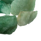 Lifestyle still of Aventurine raw crystal, often kept for Emotional Healing, with subtle natural color showing through.
