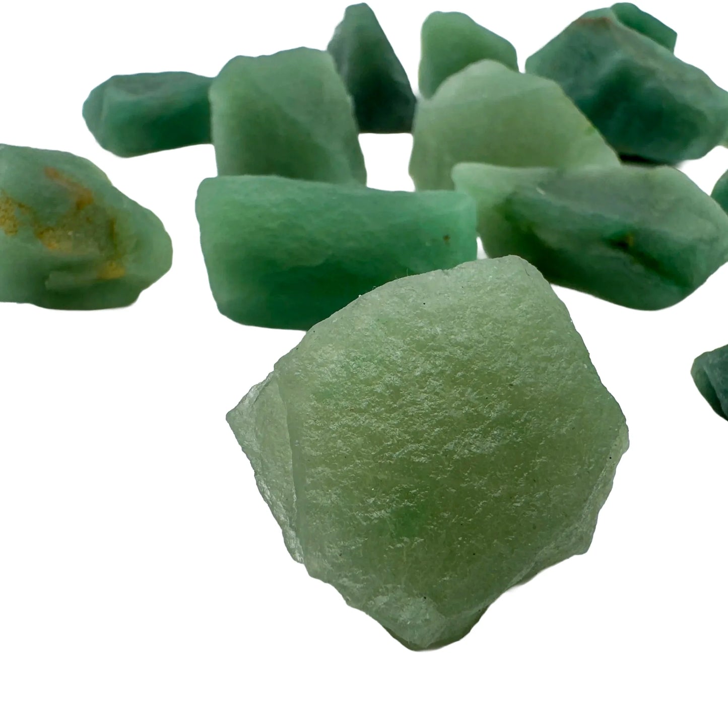 Lateral view of Aventurine raw stone, Brazil-sourced, showing characteristic color.