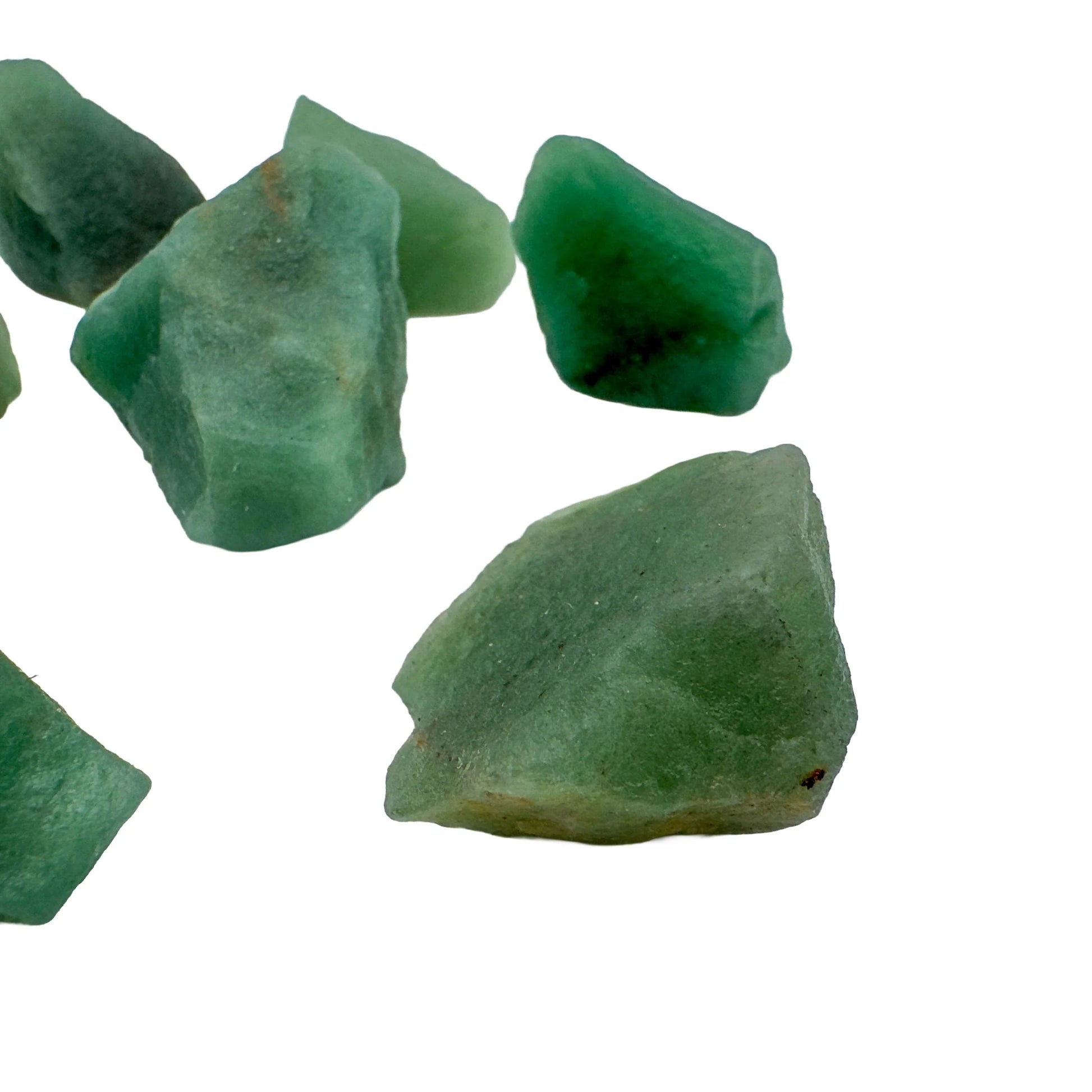 Top angle of green Aventurine raw stone, showing characteristic patterning, Brazil-sourced.