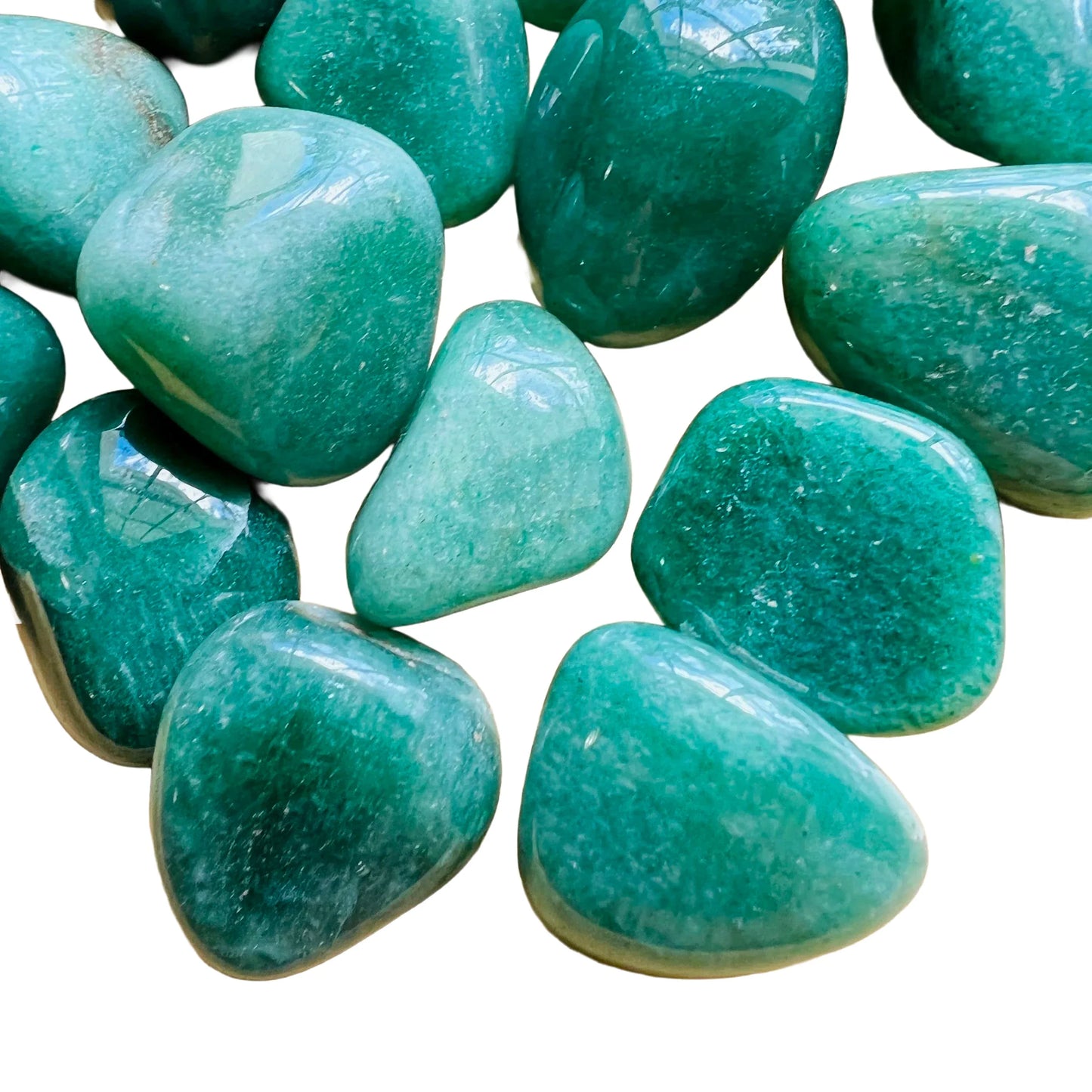 Overhead angle of green Aventurine tumbled stone, from Brazil, traditionally used for Luck.