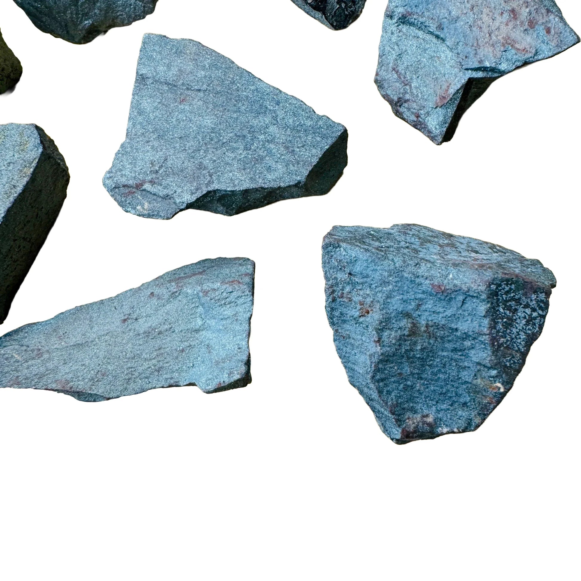 Edge-on view of gray Hematite raw stone, for Grounding, from Minas Gerais, Brazil.