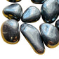 Side-on view of Hematite tumbled stone, Brazil-sourced.