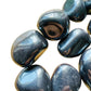 Top view of Hematite tumbled stone, for Grounding, sourced from Brazil.