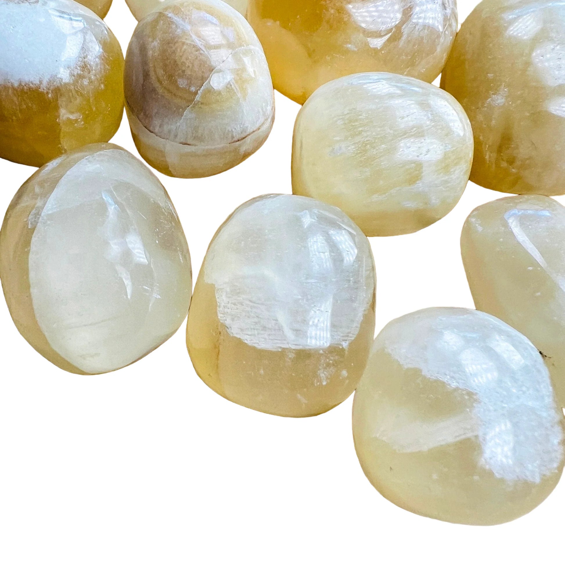 Side perspective of Honey Calcite tumbled stone, turned to for Confidence and Career, hand-selected from Ancash, Peru.