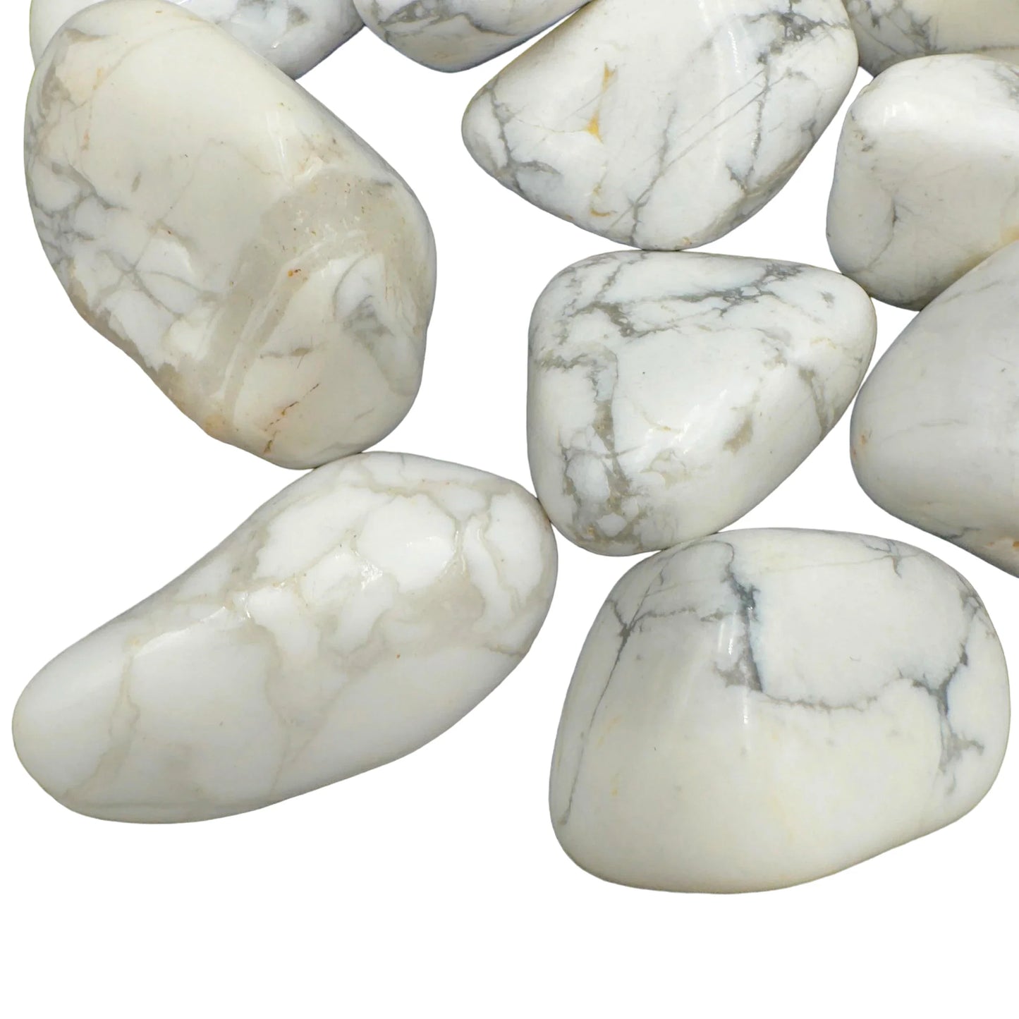 Side profile of Howlite tumbled stone, hand-selected from Masvingo, Zimbabwe, to support Stress Relief.