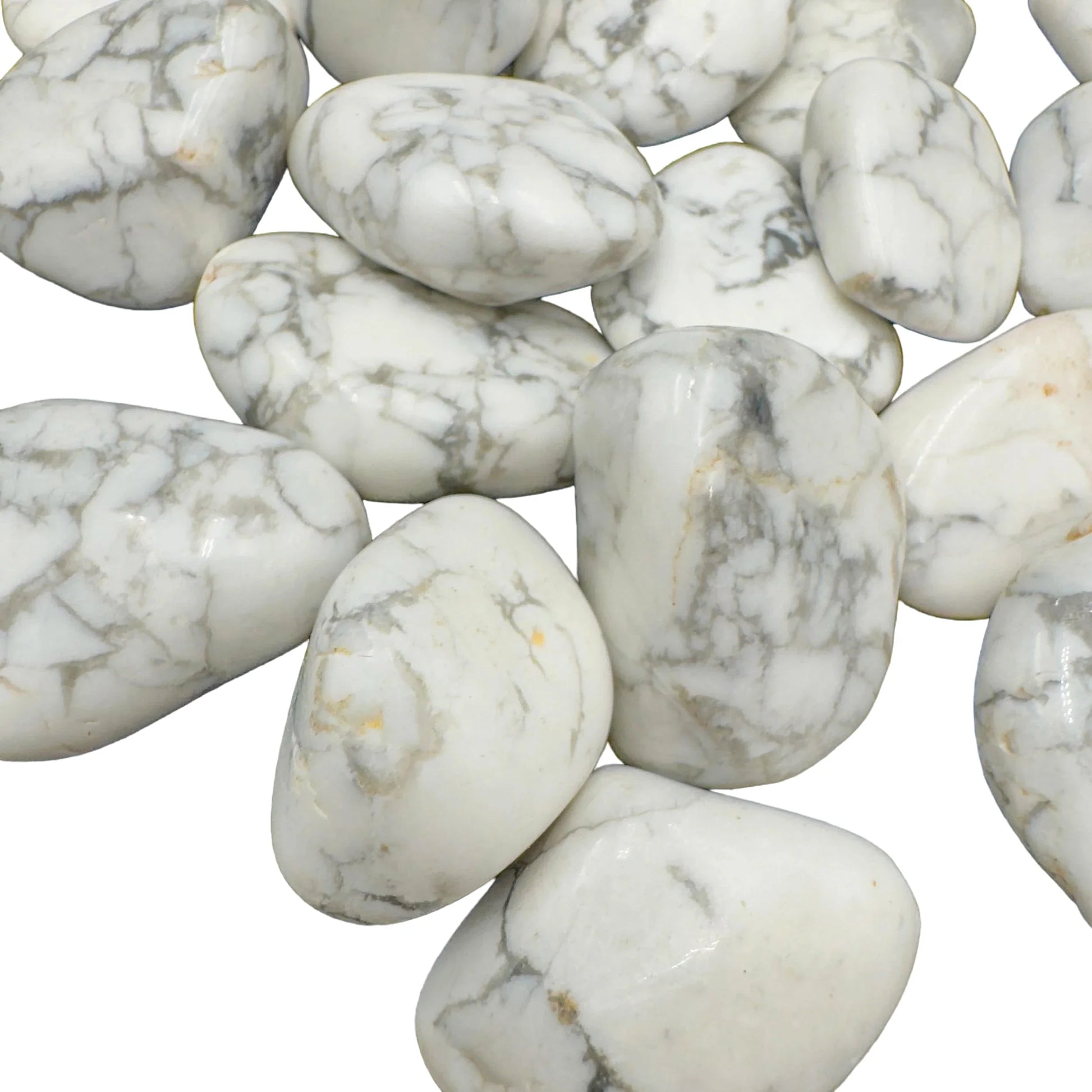 Side angle of Howlite tumbled stone, hand-selected from Masvingo, Zimbabwe, showing characteristic finish.