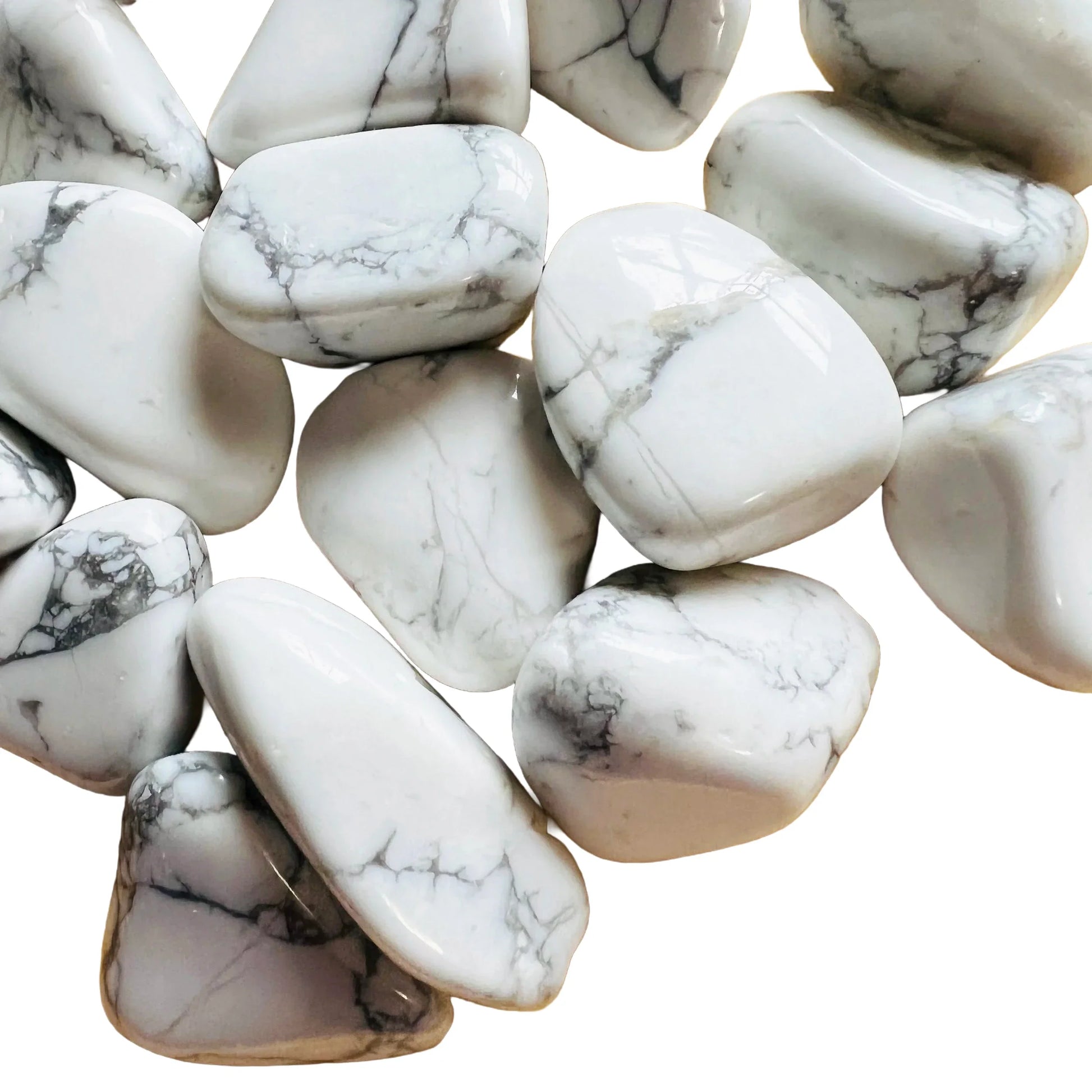 Detail shot of Grade AA Howlite tumbled stone under natural light