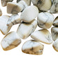 Detail capture of Howlite tumbled stone, showing natural inclusions.
