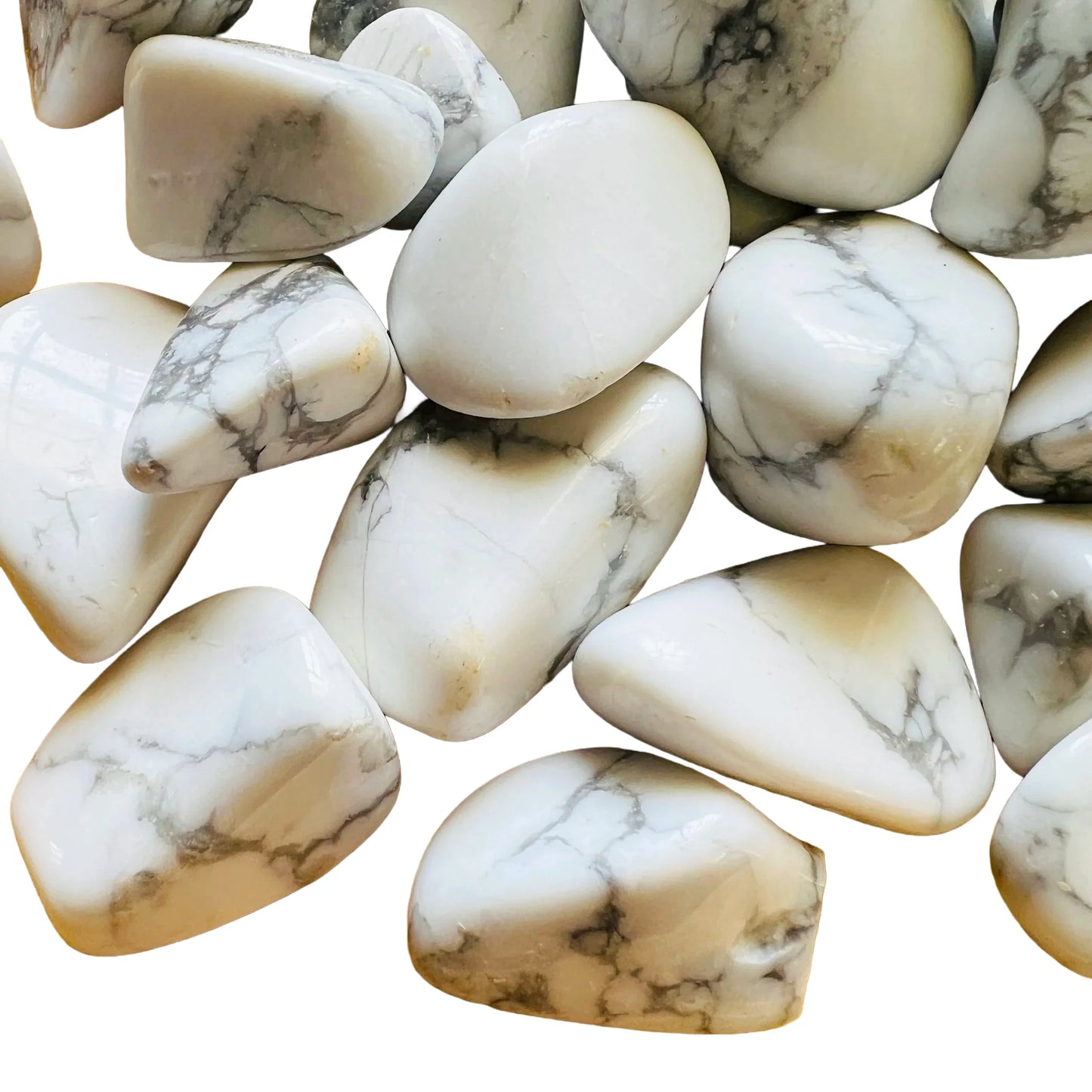 Detail capture of Howlite tumbled stone, showing natural inclusions.