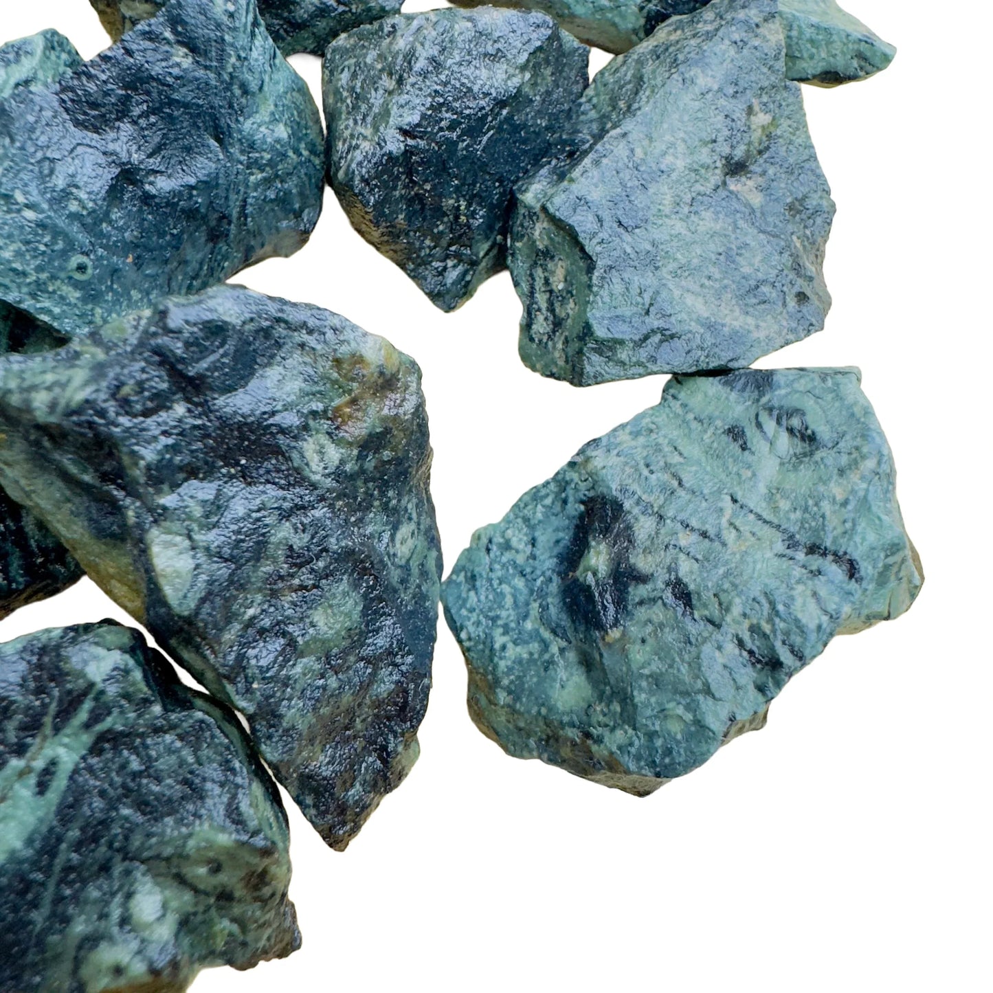 Daylight view of a single Kambaba Jasper raw stone sourced from Madagascar.