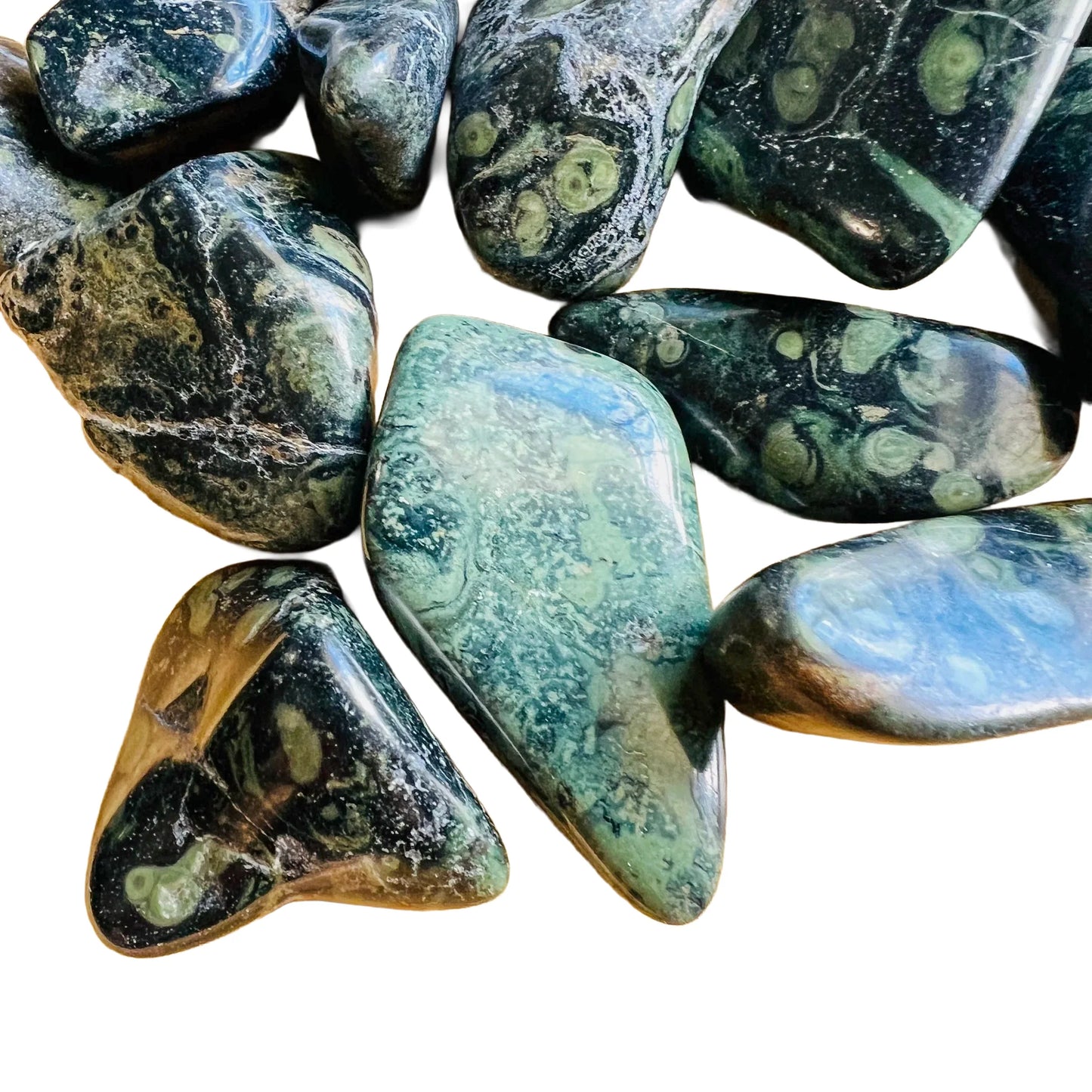 Magnified detail of Kambaba Jasper tumbled stone, showing natural sheen, sourced from Madagascar.