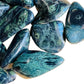 Edge view of Grade AA green Kambaba Jasper tumbled stone, linked to Grounding and Stress Relief.