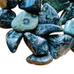 Overhead angle of Grade AA Kambaba Jasper tumbled stone, showing characteristic color, linked to Grounding and Stress Relief.