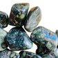 Bottom side of Kambaba Jasper tumbled stone, often worked with for Grounding, sourced from Bongolava, Madagascar.