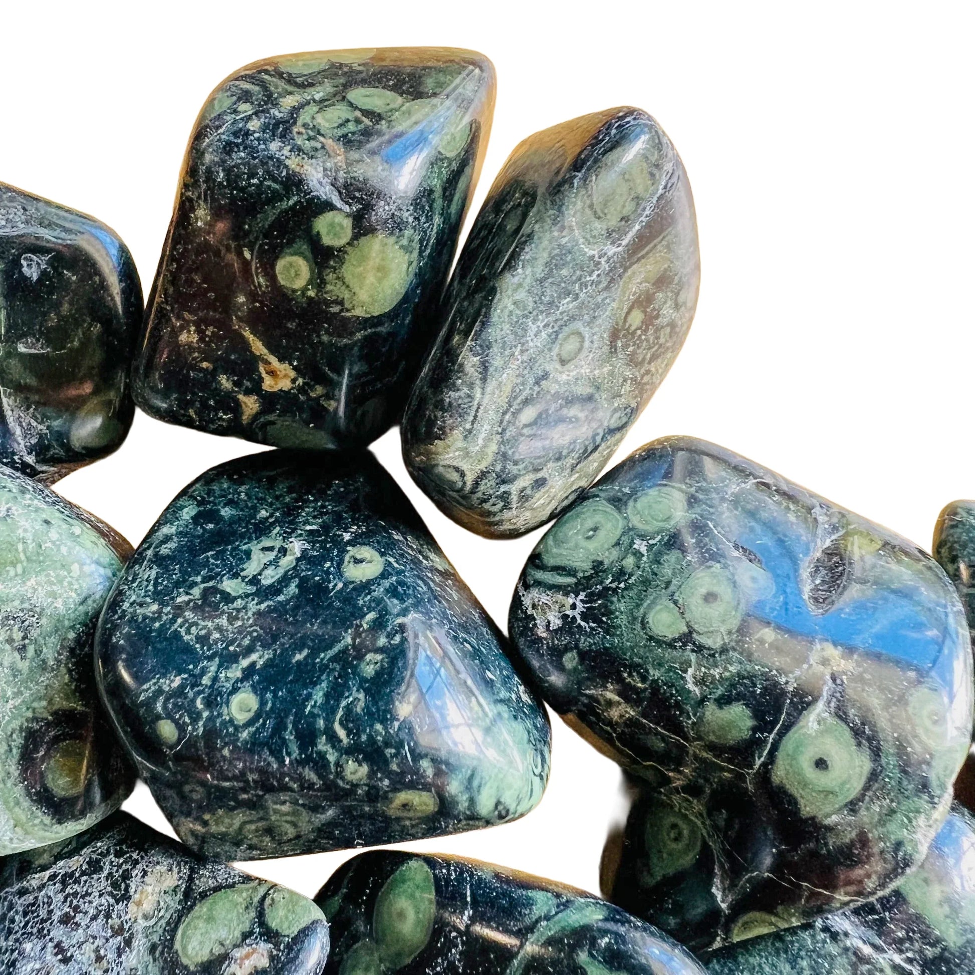 Bottom side of Kambaba Jasper tumbled stone, often worked with for Grounding, sourced from Bongolava, Madagascar.