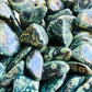 Overhead view of Kambaba Jasper tumbled stone, showing characteristic finish, often paired with practices around Grounding.