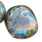 Sideways view of Labradorite palm stone, from Atsimo-Andrefana, Madagascar.